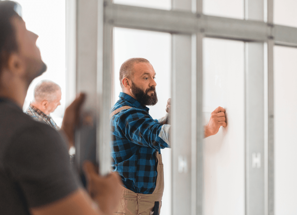 Home service professionals working at a house